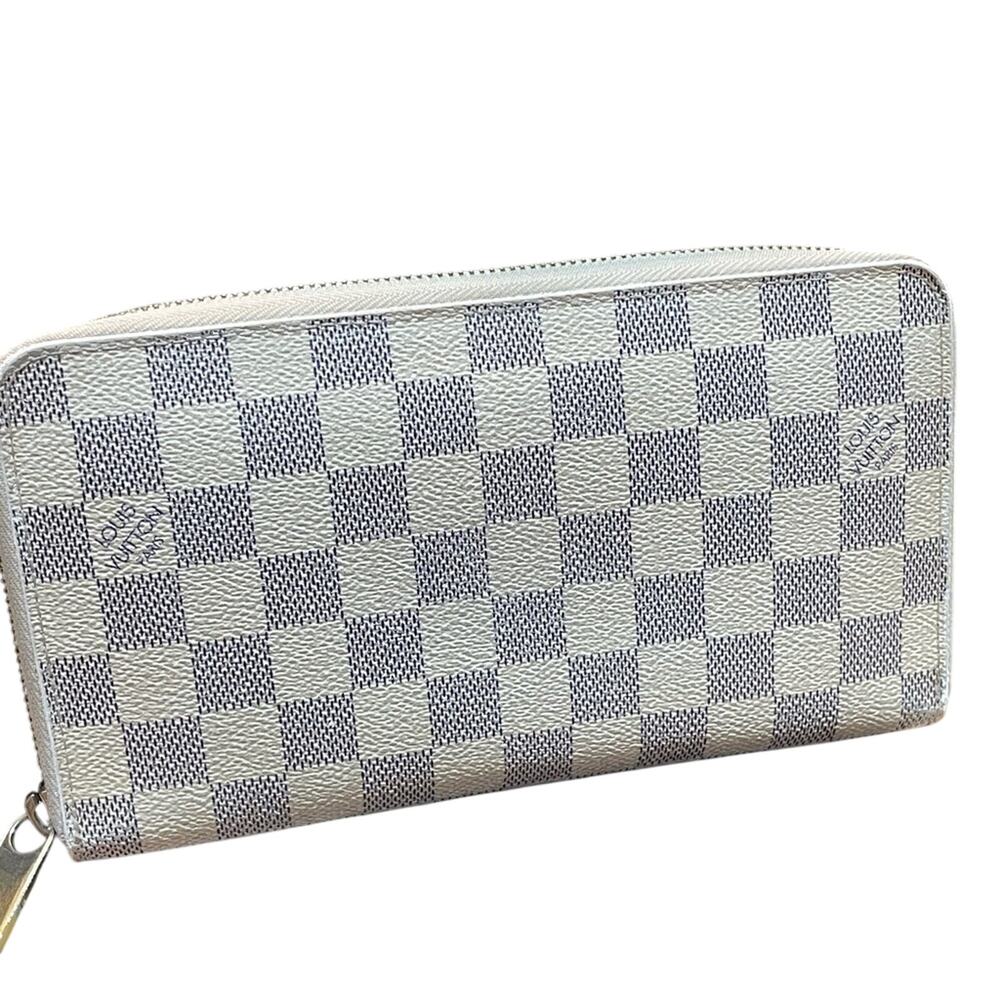 Louis Vuitton Azure large Organizer Wallet Full zip. Comes with a COA